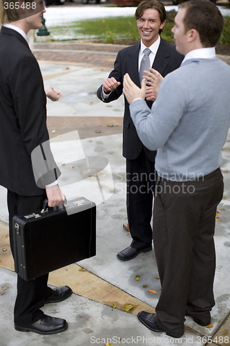 Image of businessmen talking