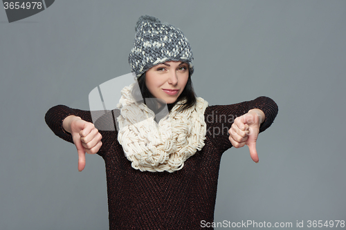 Image of Beautiful afro lady with thumb down