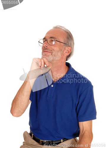 Image of Thinking man with hand on chin.