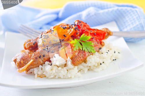 Image of boiled rice with meat and vegetables