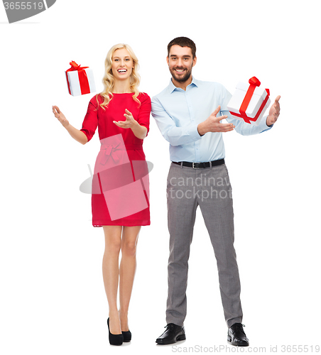Image of happy couple with gift boxes