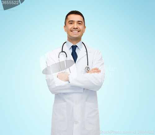 Image of smiling male doctor in white coat