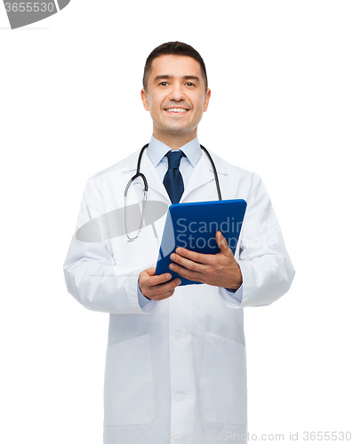 Image of smiling male doctor in white coat with tablet pc