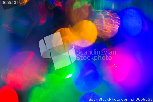 Image of colorful night lights bokeh over dark background