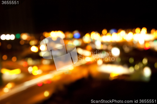 Image of golden bright lights on dark night background