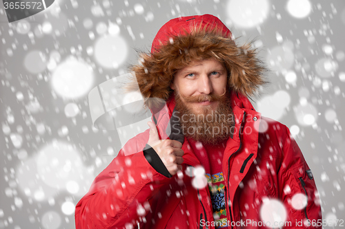 Image of bright picture of handsome man in winter jacket