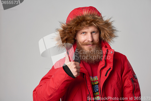 Image of bright picture of handsome man in winter jacket