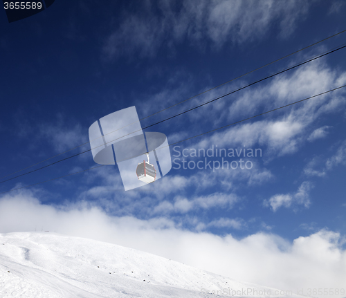 Image of Gondola lift and blue sky with clouds in nice day