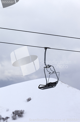 Image of Chair lift at evening