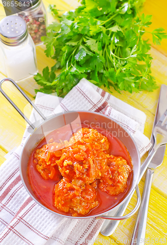 Image of meat ball with tomato sauce