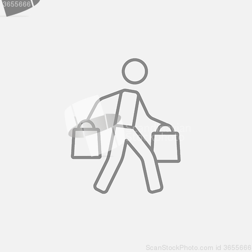 Image of Man carrying shopping bags line icon.