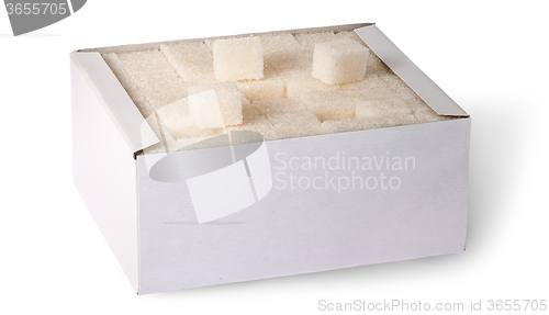 Image of White sugar cubes in a box top view