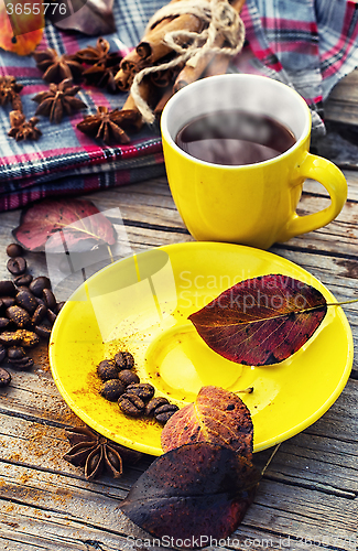 Image of Black coffee in yellow cup