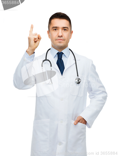 Image of male doctor in white coat pointing finger up