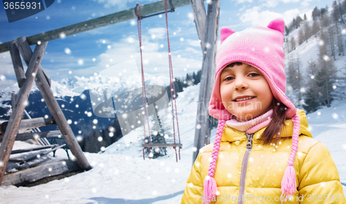 Image of happy beautiful little girl portrait over winter