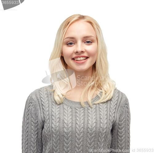 Image of smiling young woman or teenage girl in pullover