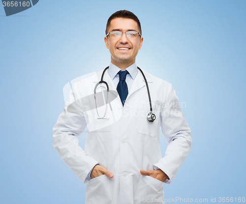 Image of happy male doctor in white coat s with stethoscope