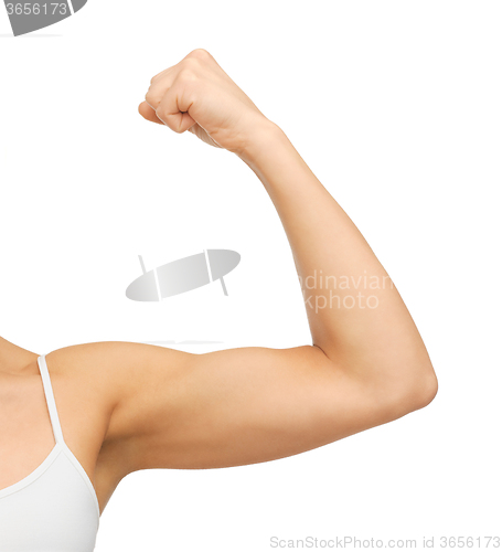 Image of sporty woman flexing her biceps