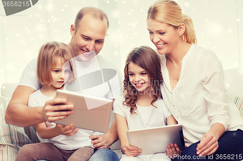 Image of happy family with tablet pc computers