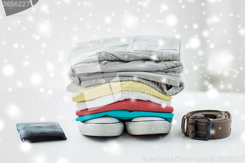 Image of close up of clothes and accessories on table