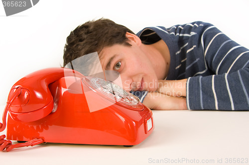 Image of man waiting for a call