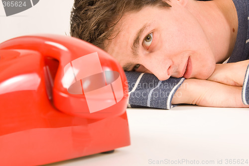 Image of man waiting for a call