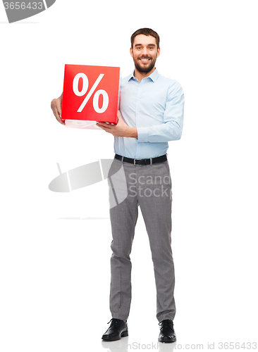 Image of smiling man with red shopping bag