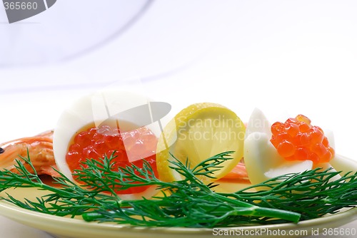 Image of Red salmon caviar and cooked shrimps