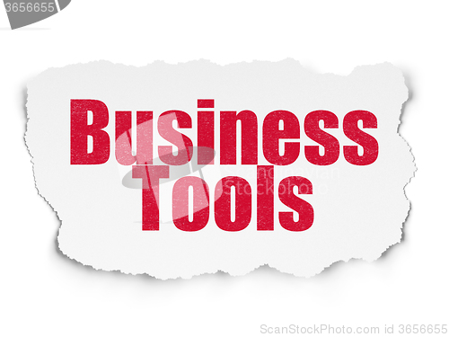 Image of Business concept: Business Tools on Torn Paper background