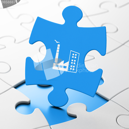 Image of Finance concept: Industry Building on puzzle background
