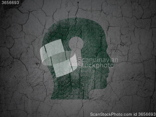 Image of Finance concept: Head With Keyhole on grunge wall background