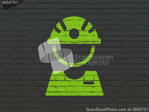 Image of Industry concept: Factory Worker on wall background