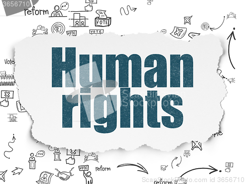 Image of Political concept: Human Rights on Torn Paper background