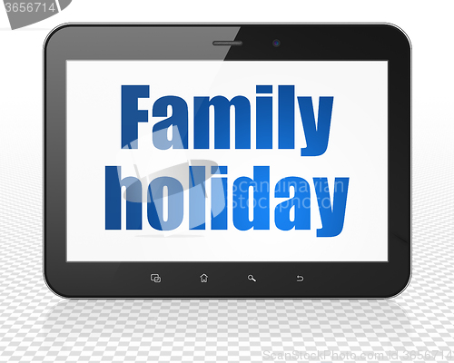 Image of Vacation concept: Tablet Pc Computer with Family Holiday on display