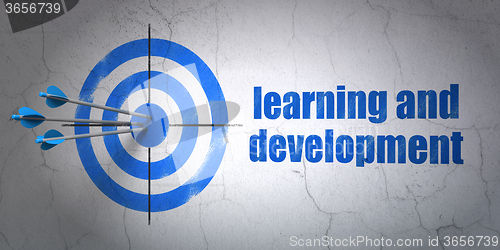Image of Studying concept: target and Learning And Development on wall background