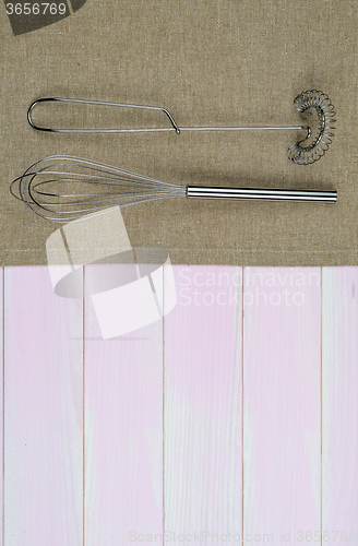 Image of Kitchenware on beige towel