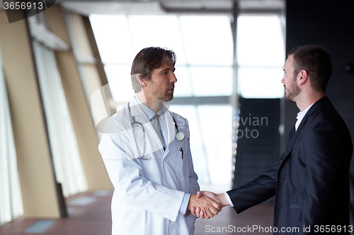 Image of doctor handshake with a patient