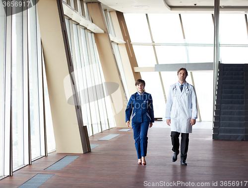 Image of doctors team walking