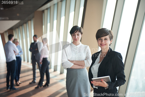 Image of business people group, females as team leaders