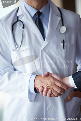 Image of doctor handshake with a patient