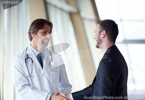 Image of doctor handshake with a patient