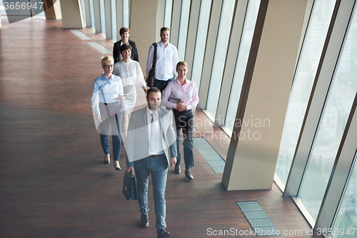 Image of business people group walking