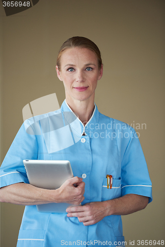 Image of female doctor with tablet computer