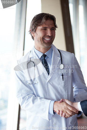 Image of doctor handshake with a patient