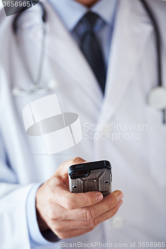 Image of doctor speaking on cellphone