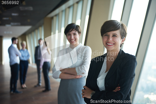 Image of business people group, females as team leaders