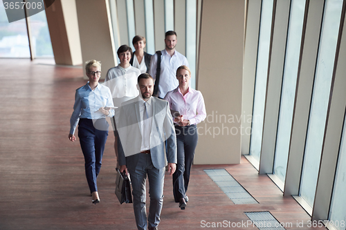 Image of business people group walking