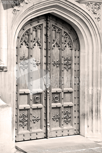 Image of parliament in london old church door and marble antique  wall