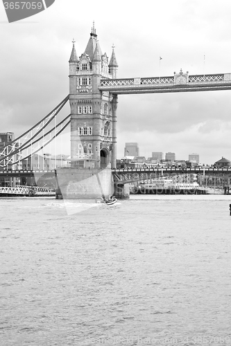 Image of london tower in england old bridge and the cloudy sky