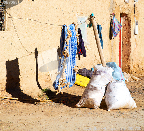 Image of bags  roof  moroccan old wall and brick in antique city
